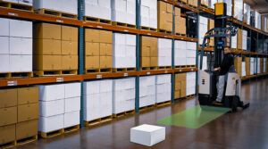 A demonstration of a forklift in a warehouse detecting an object in its path