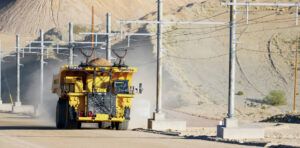 Komatsu's power agnostic electric drive truck connected to a dynamic trolley line