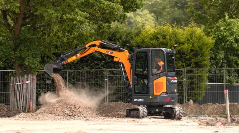 The DX25Z-7 mini excavator working on a construction site