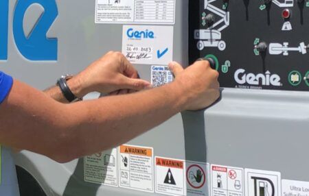 A QR being placed on a machine