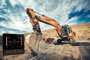 A large yellow excavator branded 'Xwatch' is positioned on a gravel construction site with a dirt mound in the background under a partly cloudy sky. White dashed lines and angles are overlaid on the image, showing measurements related to the excavator's arm and bucket. A digital display in the bottom left corner shows readings including left and right limits of 40.0m, various distances, and an angle of 2.73
