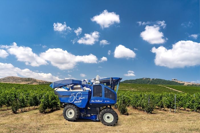 Grape harvester machine with special 50th decal