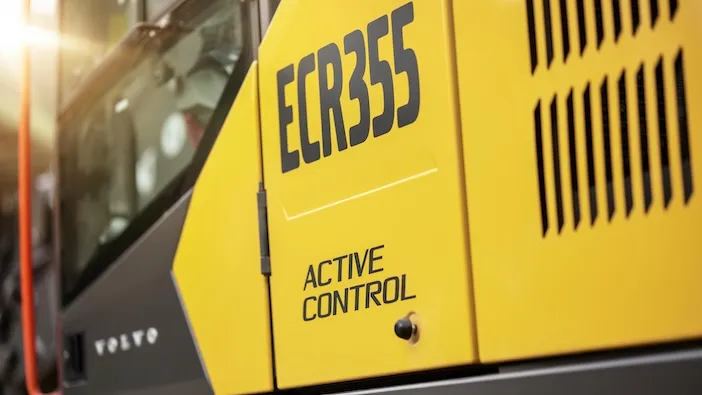 Larson Cable Trailers' Electrical LCT-7500 E: Step Towards Greener Fiber Set up - Machinery Asia Close-up view of Volvo ECR355 excavator showing Active Control system branding on yellow machine housing