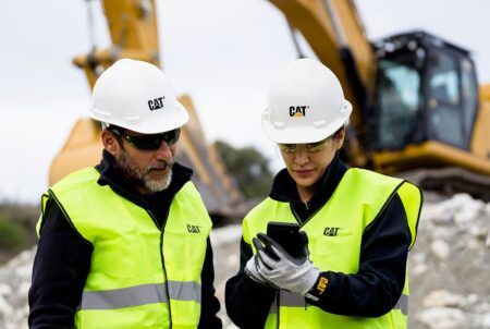 Caterpillar workers on a jobsite