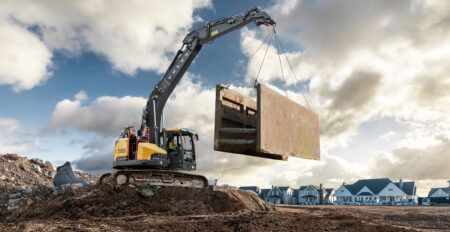 Volvo CE to debut new short-swing excavator at ConExpo Volvo CE's ECR255 short-swing excavator lifting materials