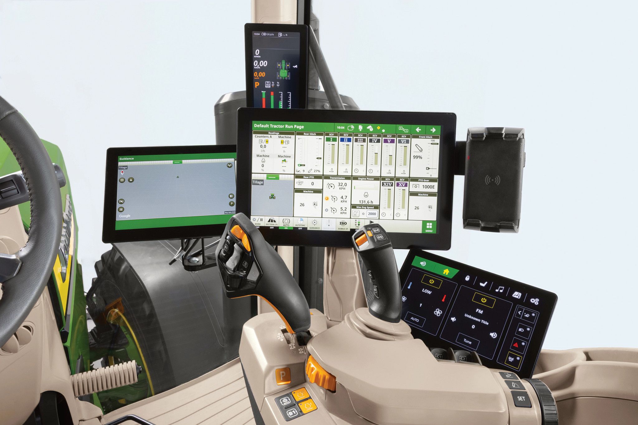 Interior view of the John Deere 8 series CommandView 4 cab showing the redesigned CommandArm with dual joysticks, multiple touchscreen displays and inductive phone charging mount