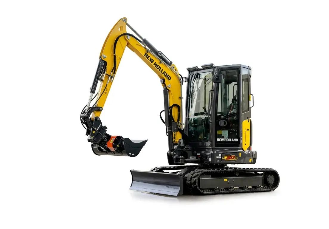 A New Holland Construction E30D mini excavator with yellow boom and enclosed black cab, shown in three-quarter view against a white background. The machine is fitted with a quick coupler, bucket attachment and front dozer blade.