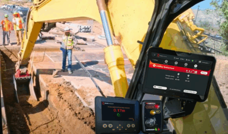 View from inside an excavator cab showing the RodRadar in-cab display reading 0.17m depth detection and a tablet screen showing a "Utility Detected" alert, with workers and a yellow excavator visible operating in a trench in the background.