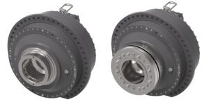 Two rendered views of the Vickers by Danfoss ICMB industrial cam lobe motor, a compact cylindrical radial piston hydraulic motor finished in dark grey, showing different shaft interface configurations
