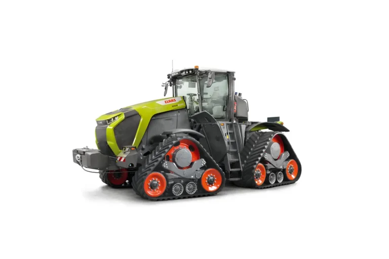 Studio render of the Claas Xerion 12 large tractor on Terra Trac crawler track units, shown in three-quarter front view against a white background