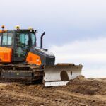 Develon expands dozer lineup with new DD100 for precision grading