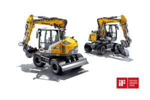 Studio image of two Liebherr wheeled excavators – the A 909 Compact (left) and A 911 Compact Litronic (right) – shown side by side on a white background. Both machines are finished in Liebherr's yellow and grey livery with booms extended. The iF Design Award 2026 logo is displayed in the bottom right corner.