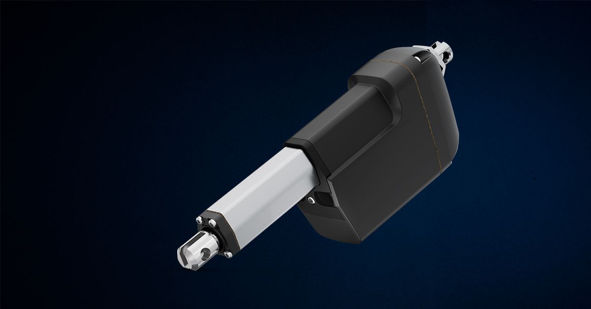 Close-up of a single Linak LA21 electric actuator shown at an angle against a dark blue background, showing the black housing and silver extending rod