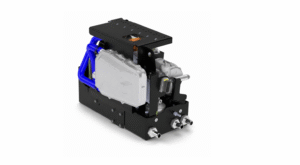 Product render of the Calatherm BTMS 1 (800V) battery thermal management system, showing blue coolant pipework, integrated water heater and CAN-controlled unit mounted on a black chassis frame.