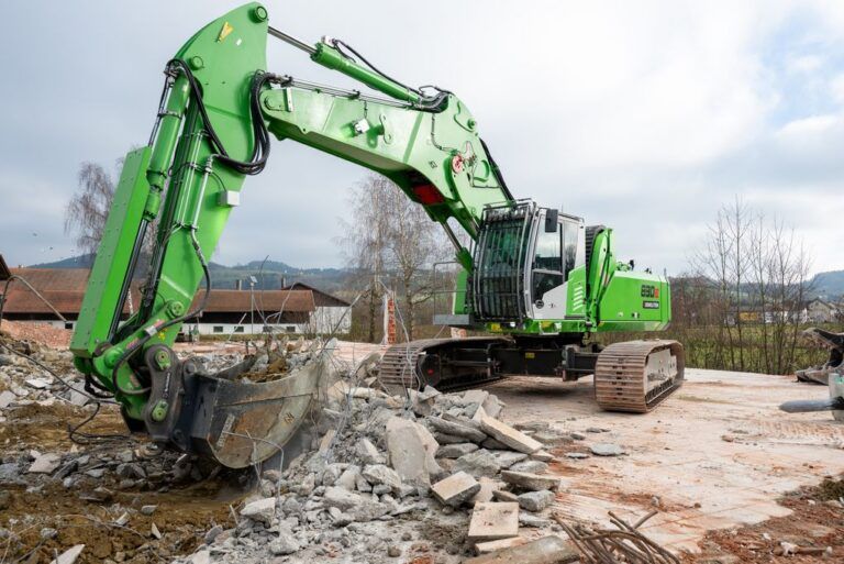 Sennebogen to showcase two demolition excavators at Steinexpo 2026 Green Sennebogen 830 E Demolition excavator working over broken concrete on a demolition site