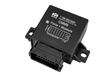 MRS Electronic broadens portfolio with CMM9 measurement module A compact black measurement module with a multi-pin connector on the front face and a wiring diagram printed on the top housing
