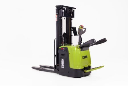 Studio product shot of the green and black Clark RSE16 ride-on high-lift truck with a fold-down operator platform and mast, against a white background
