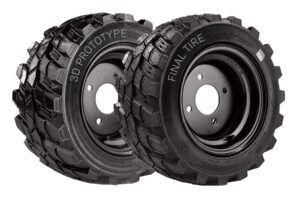 A side-by-side comparison of a 3D-printed prototype tire and the corresponding finished production tire from OTR3DLab