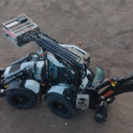 Huddig unveils new hybrid-electric excavator-loader with bigger battery